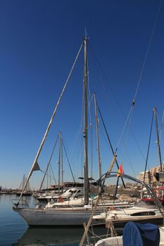 Santa Pola, Spain- 15 February, 2018: Recreational boats moored at the dock in the nautical club of Santa Pola in a sunny day