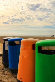 Colorful Recycling bins on the beach in Santa Pola, Alicante
