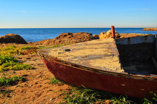 Old abandoned boat on the beach