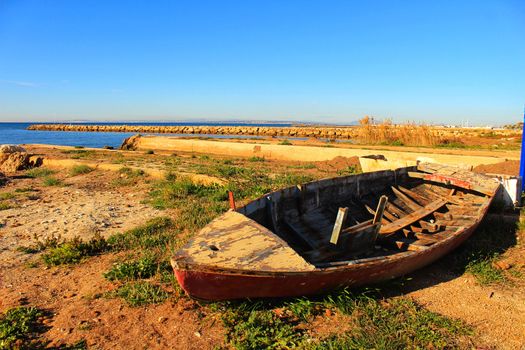 Old abandoned boat on the beach