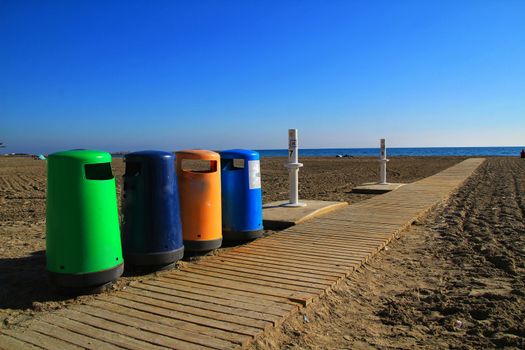 Colorful Recycling bins on the beach in Santa Pola, Alicante