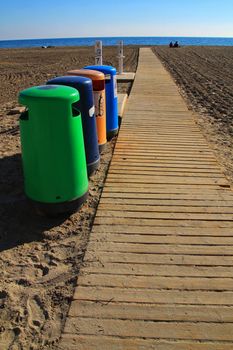 Colorful Recycling bins on the beach in Santa Pola, Alicante