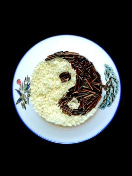 the tao symbol of yin and yang made of rice