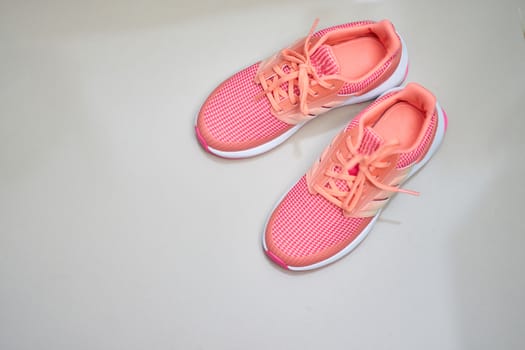 pink sport shoes on top view