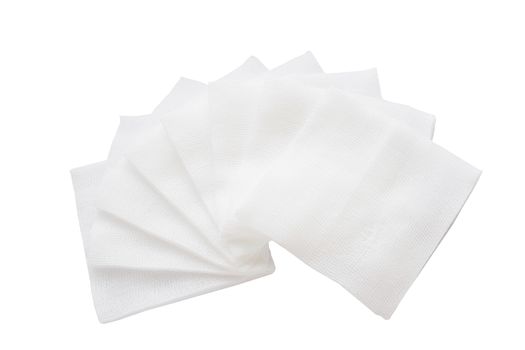 Pile of pad gauzes on isolated white background in fan shape.jpg
