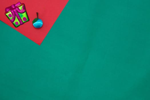 Present  box  and fruit on red and green background with copy space for new year and christmas time