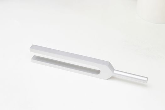Tuning fork side arrangement on white isolated background