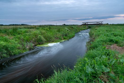 A whirlpool on the Uherka river in eastern Poland, evening view