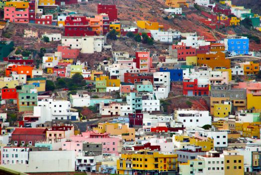 a lot of houses next to each other of a colorfull village 