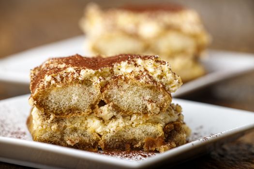 tiramisu cake on white plates