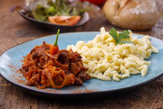 szegedin goulash on dark wood