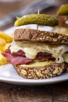 reuben sandwich on rustic wood