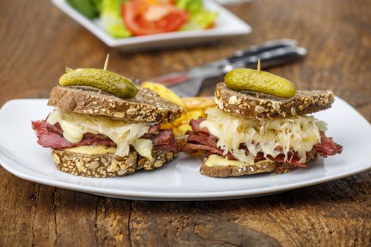 reuben sandwich on rustic wood