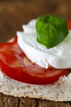 italian caprese sandwich on wood