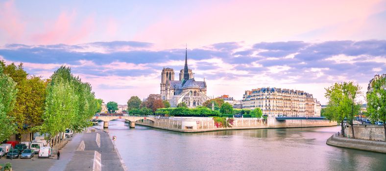 The beautiful Notre Dame de Paris and Seine River at twilight