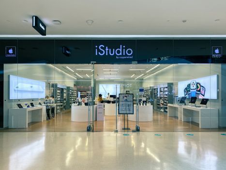 iStudio, Apple premium shop by Copperwired, at the Central Embassy, Bangkok, Thailand with pandemic influenza precautions procedure during Covid-19 situation