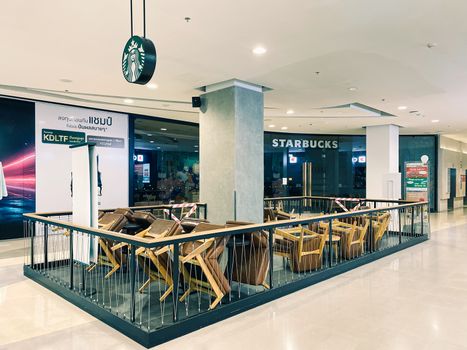 Starbucks coffee in shopping mall in Bangkok closed during COVID-19 situation. Starbucks is temporarily shuttering many shops because of the coronavirus pandemic