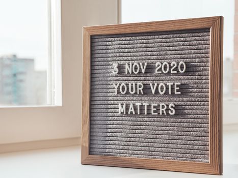 Announcement of USA Presidential Election at 3rd November 2020. Call to go to the vote. Letter board on white window sill.