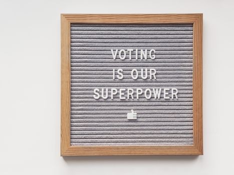 Letter board with words Voting is Our Superpower. Announcement of USA Presidential Election at 3rd November 2020. Call to go to the vote.