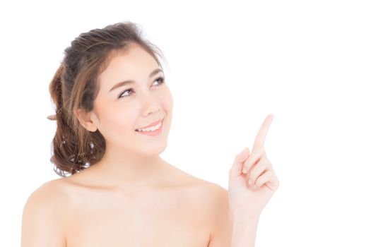 Portrait of beautiful asian woman makeup of cosmetic, beauty of girl with face smile and finger point something attractive isolated on white background, perfect with wellness and healthcare concept.