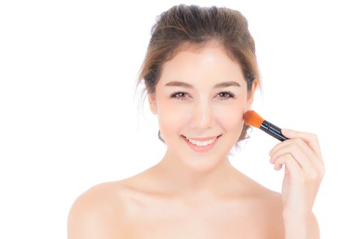 Beauty asian woman applying make up with brush of cheek isolated on white background, beautiful of girl holding blusher, skincare and cosmetic concept.