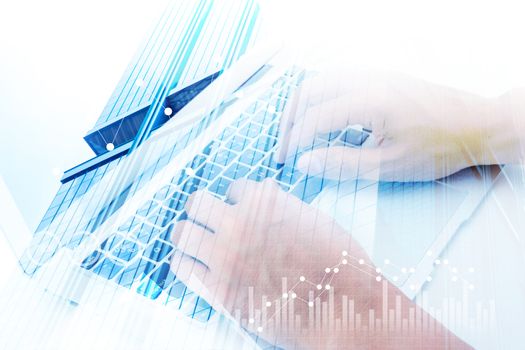 Closeup of man hand using laptop on office desktop, business chart and diagram with abstract, computer analysis revenue data with finance of stock, buiness economy concept.