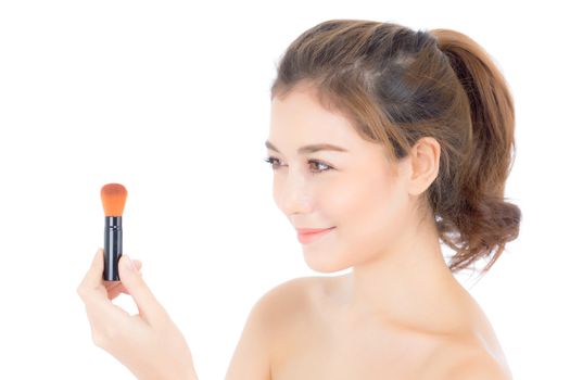 Beauty asian woman applying make up with brush of cheek isolated on white background, beautiful of girl holding blusher, skincare and cosmetic concept.
