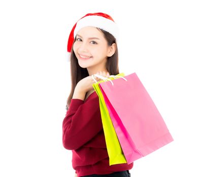 Happy fashion asian woman with smile holding shopping paper bag, Sale and christmas with holiday, girl with buyer enjoy and excited isolated on white background, season holiday concept.