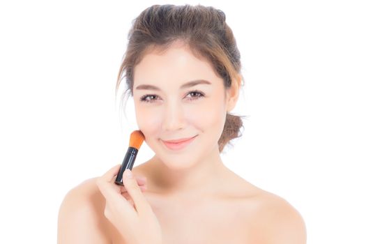 Beauty asian woman applying make up with brush of cheek isolated on white background, beautiful of girl holding blusher, skincare and cosmetic concept.