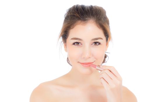 Beauty asian woman applying make up with lipstick of mouth isolated on white background, Beautiful girl on lips with happy, skincare and cosmetic concept.