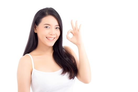 Portrait of beautiful asian woman makeup of cosmetic, beauty of girl with face smile and gesture ok attractive isolated on white background, perfect with wellness and healthcare concept.