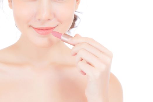 Beauty asian woman applying make up with lipstick of mouth isolated on white background, Beautiful girl on lips with happy, skincare and cosmetic concept.