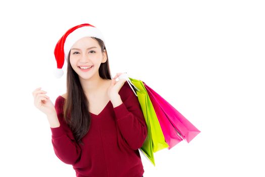 Happy fashion asian woman with smile holding shopping paper bag, Sale and christmas with holiday, girl with buyer enjoy and excited isolated on white background, season holiday concept.
