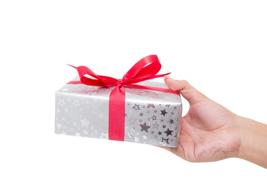 Red gift box white ribbon holding hand isolated on white background, using for christmas and new year or holiday other.