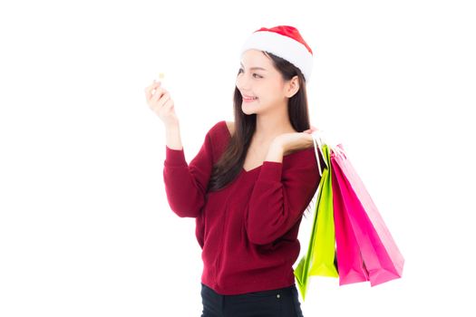 Happy fashion asian woman with smile holding shopping paper bag and credit card, Sale and christmas with holiday, girl with buyer enjoy and excited isolated on white background, season holiday concept.