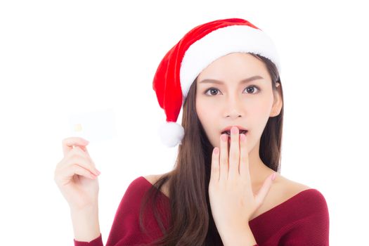 Portrait of beautiful asian young woman in santa hat smile holding credit card, girl have happy with shopping isolated on white background, christmas and holiday concept.
