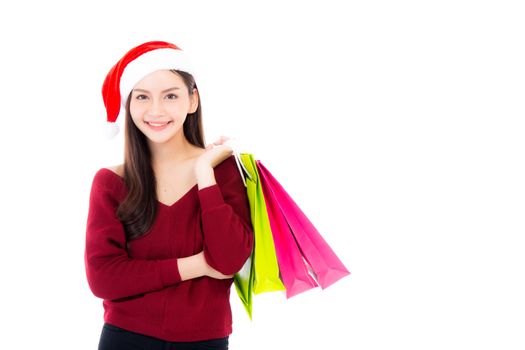 Happy fashion asian woman with smile holding shopping paper bag, Sale and christmas with holiday, girl with buyer enjoy and excited isolated on white background.