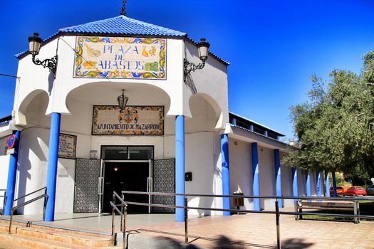 Mazarron, Murcia, Spain- October 3, 2019: Beautiful old food market painted in white and blue in Mazarron village in Murcia