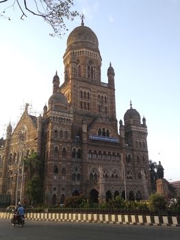 Mumbai headquarters, Fort, Mumbai, Maharashtra India. May-03-2019, tourist visiting (only outside area) for looking and enjoying the architecture of headquarters visit the place.