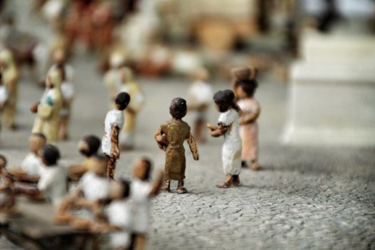 Cartagena, Murcia, Spain- July 27, 2019: Miniature roman figurines displayed in a Cartagena Museum reflecting daily life in roman times