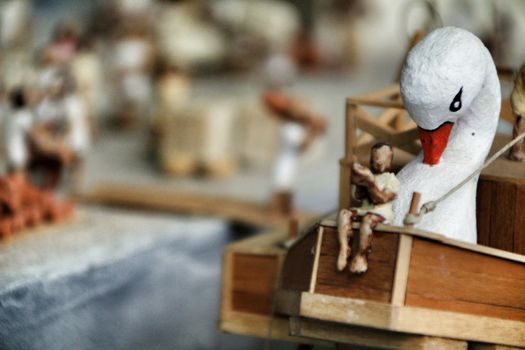 Cartagena, Murcia, Spain- July 27, 2019: Miniature roman figurines displayed in a Cartagena Museum reflecting daily life in roman times