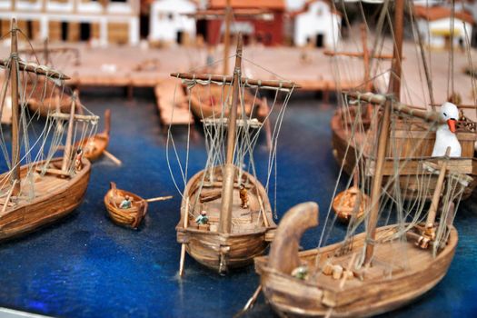 Cartagena, Murcia, Spain- July 27, 2019: Miniature roman figurines displayed in a Cartagena Museum reflecting daily life in roman times