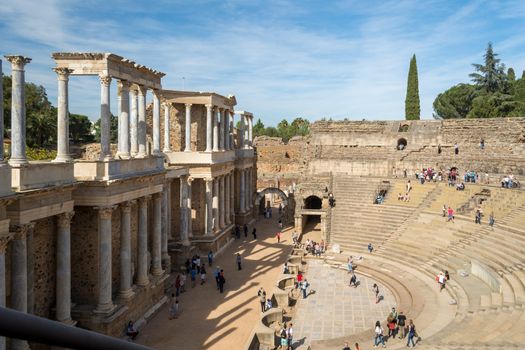 Merida, Spain, April 2017, tourists visiting the Roman ruins theatre arena & waiting rooms used for gladiator & animal fights. Travel and tourism.