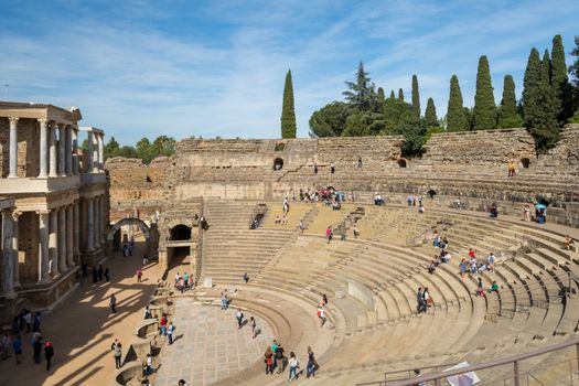 Merida, Spain, April 2017, tourists visiting the Roman ruins theatre arena & waiting rooms used for gladiator & animal fights. Travel and tourism.