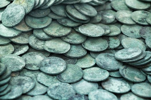 Cartagena, Murcia, Spain- July 25, 2019: Spanish silver coins recovered from the ocean floor by the Odissey company and exposed in underwater museum in Cartagena, Spain