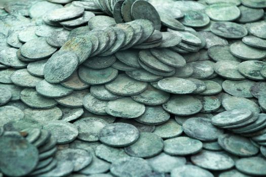 Cartagena, Murcia, Spain- July 25, 2019: Spanish silver coins recovered from the ocean floor by the Odissey company and exposed in underwater museum in Cartagena, Spain