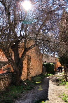 Riopar Viejo, Albacete, Spain- February 8, 2019: Old beautiful stone facades and streets in Riopar Viejo village, Castilla La Mancha, Spain. Sunny day of winter.