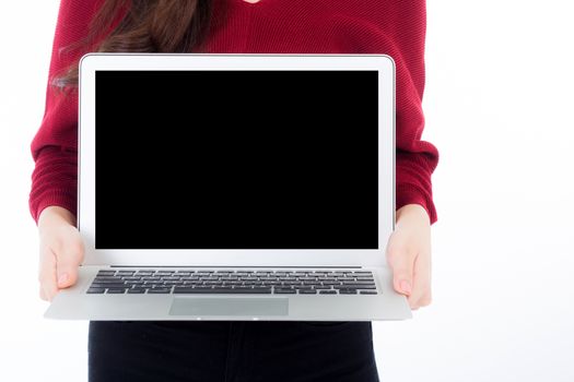 Happy businesswoman howing blank laptop or notebook screen isolated on white background.
