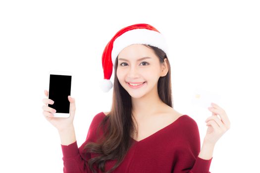 Beautiful asian young woman shopping with credit card and holding mobile phone in christmas holiday, girl with payment isolated on white background.