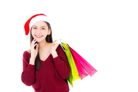 Happy fashion asian woman with smile holding shopping paper bag, Sale and christmas with holiday, girl with buyer enjoy and excited isolated on white background.